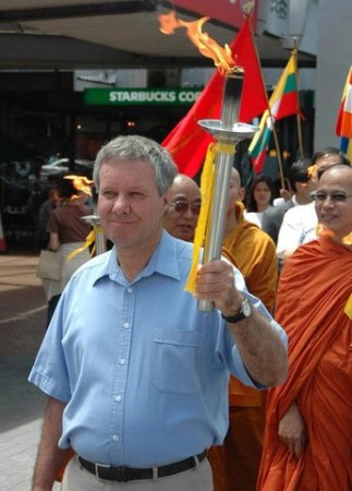 Keith with torch, protesting Chinese Olympics