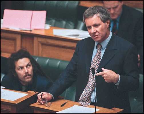 Keith speaking in Parliament with Nandor Tanczos